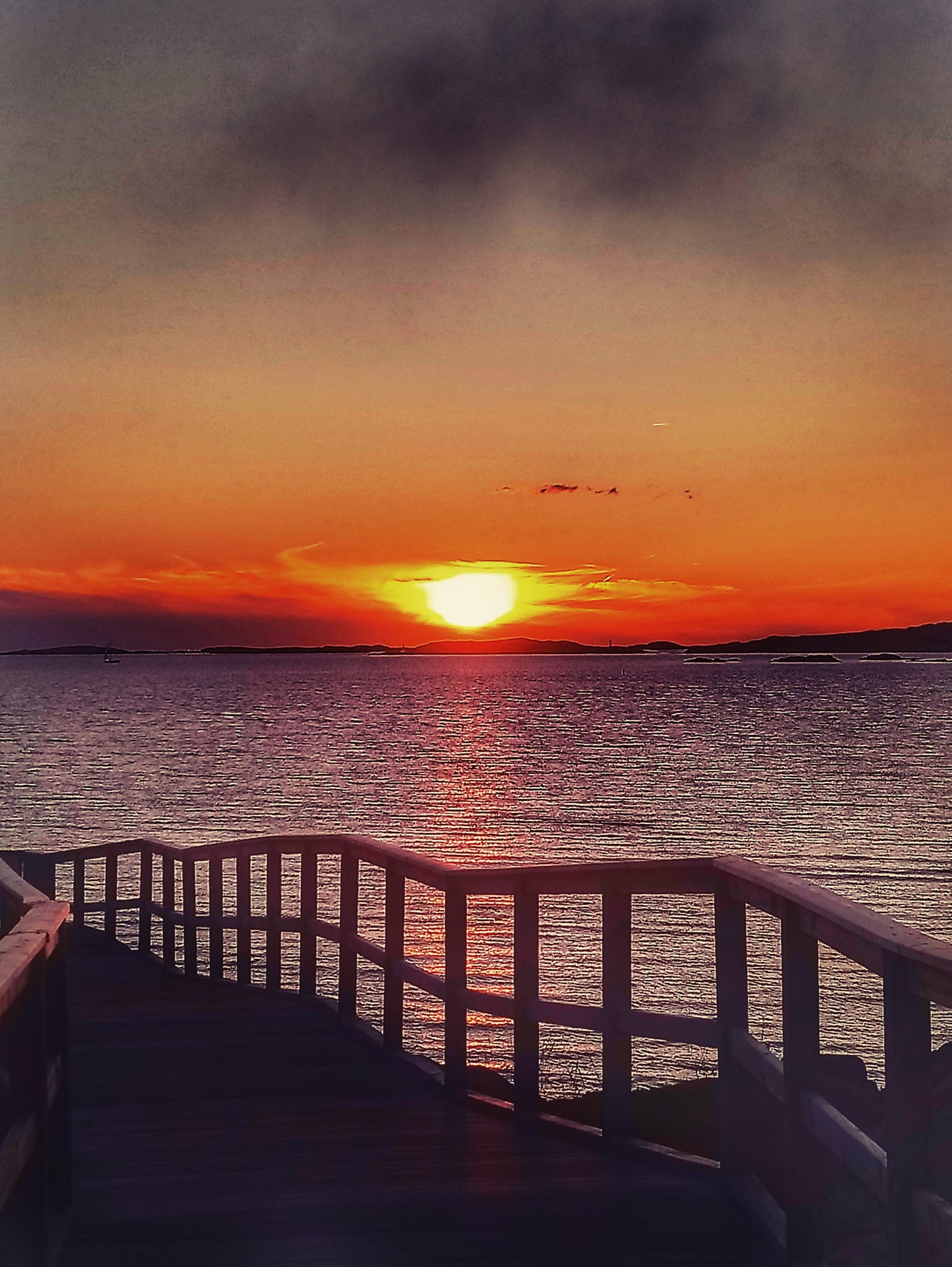 Solnedgång strandpromenden